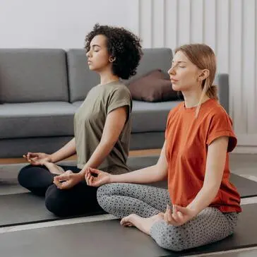 Two meditating women