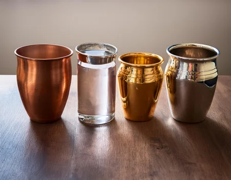 drinking water from copper bottles and glasses