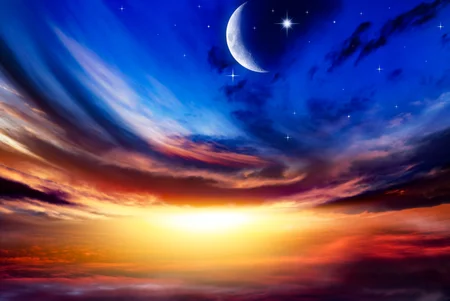 Beautiful dark fluffy cloudy sky with sun rays . Crescent moon with beautiful sunset background